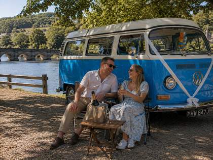 A quiet riverside pause together after the celebrations.